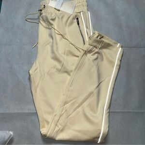 Guapi pale yellow reflective piping joggers NWT size 40